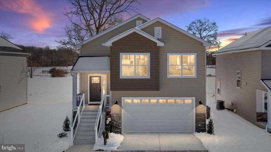 OPEN HOUSE Sat 2/7 11a-12:30p! Brand New Construction Thoughtfully designed 4-bedroom, 3 full-bath home offering an open floor plan and dramatic volume ceilings . The living room features a sleek electric fireplace and flows seamlessly into the kitchen, creating an ideal space for entertaining.

The kitchen is both stylish and functional with stainless steel appliances, including a counter-depth refrigerator, a large center island, and a bright morning room. 

The primary suite serves as a private retreat with volume ceilings, a walk-in closet, and a spa-inspired bath featuring double sinks, a linen closet, and a walk-in shower.

Two additional bedrooms share a hall bath, while the finished lower level adds exceptional flexibility with a spacious recreation room, fourth bedroom, and full bath—perfect for guests, a home office, or extended living.

Additional highlights include a dedicated laundry room and a finished two-car garage with drywall, paint, and EV hookup.

Ideally located for commuters with easy access to Fort Meade/NSA, Northrop Grumman, Annapolis, and Washington, DC, this home delivers modern design, new construction quality, and everyday convenience.