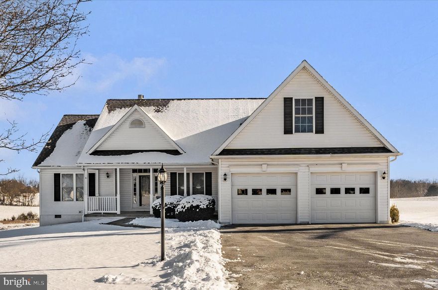 Welcome to this well-maintained, spacious rancher nestled on nearly 1 acre.  Loaded with curb appeal, this beautiful 3 bedroom, 2 bath home is in a great I-81 commuter location and close to many amenities including Spring Mills and shopping in the Hagerstown area.  It's also less than 5 minutes to the C&O canal in Williamsport, MD where you can enjoy biking and hiking and the Potomac River w/ a boat ramp. The foyer welcomes you to an open floorplan with cherry hardwood flooring throughout most of the main level. The eat-in kitchen provides stainless-steel appliances, granite counter-tops, and a breakfast bar that opens to the large great room which provides a gas fireplace for those chilly nights. The large open dining room is great for entertaining and a more formal dining experience. The primary bedroom on one side of the house has a huge walk-in closet and an en-suite bath w/custom tile flooring & shower surround, a jetted soaking tub, and a double vanity.  On the other side of the house are the 2 additional bedrooms and a second full bath. The huge carpeted upstairs bonus room could be used as a home office, exercise space, guestroom, or game room. The home was updated in 2020 and additionally has a newer 50-gallon water heater installed last year and a newer HVAC in 2021. The owner has also upgraded the faucets, ceiling fans, and light fixtures throughout. The washer and dryer convey. This home also has architectural shingles. Enjoy outdoor living in the warmer months with the huge front porch and the screened in rear porch with a view of a neighboring pond.  There is so much to love about this property!!