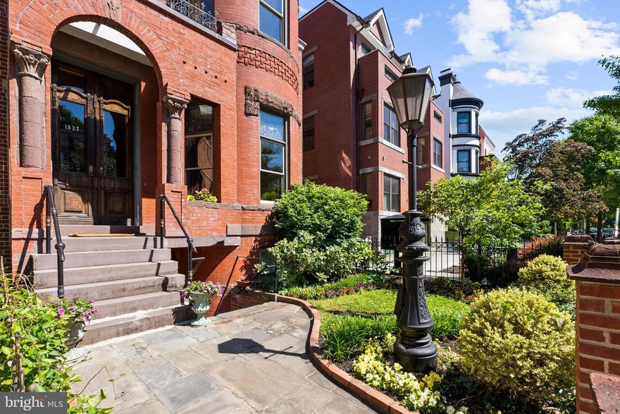 Situated on the largest lot on Logan Circle, this rare 22-foot-wide bay-front Victorian offers exceptional scale, flexibility, and over 5,000 square feet of living space—complete with an in-ground 11’ x 36’ lap pool. The home was completely renovated approximately 30 years ago, with much of its original detail and charm restored, and now presents an excellent opportunity for its next renaissance.

The main house spans approximately 3,600 square feet and features 11-foot ceilings on the first floor. A grand main level includes a formal living room, parlor, and an expansive dining room that comfortably accommodates dinner parties of 20 or more guests. Upstairs, the home offers four bedrooms, each with its own en-suite bath. The terrace level includes two separate apartments—a one-bedroom, one-bath unit and a studio—offering excellent potential for guests, rental income, or flexible living arrangements. Off-street parking.