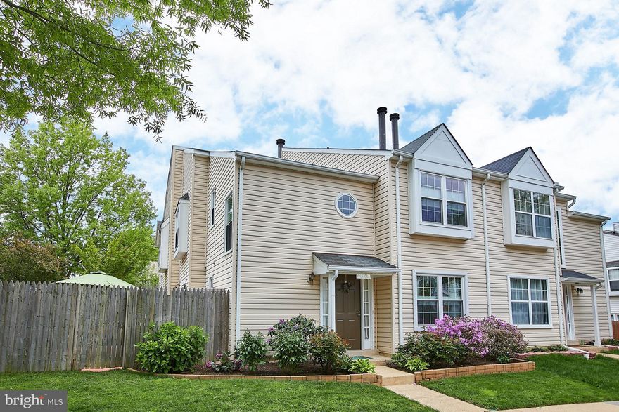 Move in Ready! Pride of Ownership shows in this spacious, clean, and bright two-level townhouse! Features Two master bedrooms, each with attached full baths & upgraded fixtures. Fresh paint throughout. Updated Kitchen with new appliances and granite countertops! Wood Burning fireplace in cozy living room! End unit has extra windows to bring in lots of light! Private brick patio off kitchen, fenced yard and lovely landscaping! Interior is very spacious. Community pool. Tot Lots..Close to schools, shopping, Metro, commuter routes. This gorgeous home won't last long!