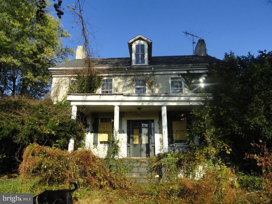16.47 acre farm w/ large farmhouse, barn & lots of other outbuildings. On (2) separate tracts. Bank owned. Buildings in disrepair but are salvageable. Opportunity for produce, tobacco farm or just bring the animals!Overgrown- but a diamond in the rough.