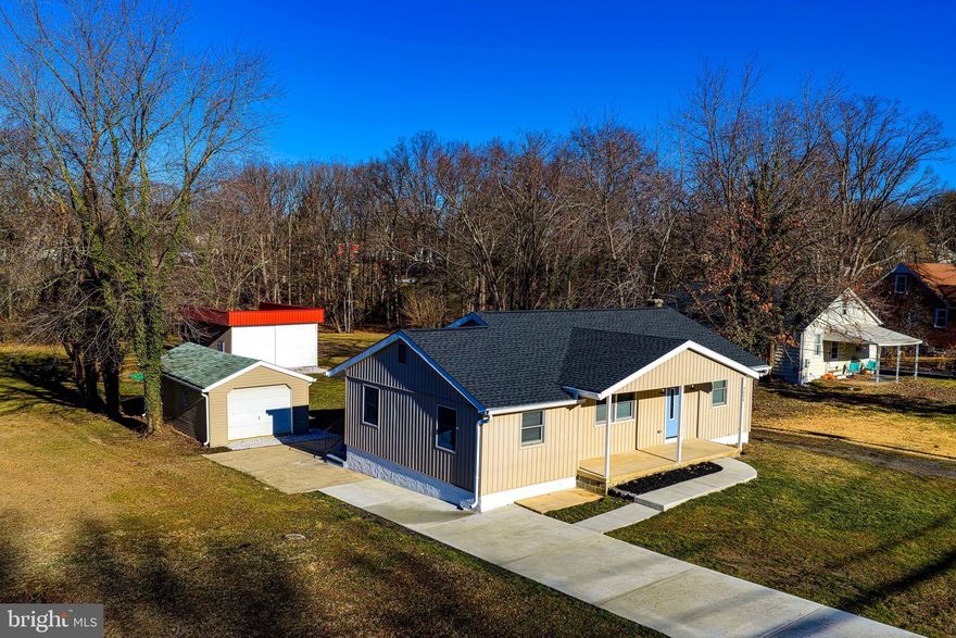 **"Welcome to 7924 Oakdale Ave, Rosedale, MD 21237 – A Masterfully Renovated Home on Over Half an Acre of land!!"**  Step into this stunning, fully renovated residence where modern elegance meets timeless charm. From the moment you arrive, you’ll be greeted by a classic front porch that offers both style and shelter. Inside, an open-concept design seamlessly connects the living room, dining area, and a beautifully reimagined kitchen featuring brand-new cabinetry, premium appliances with original warranties, and a spacious pantry tucked into the adjoining mudroom—perfect for those rainy or snowy days. The main level boasts three generously sized bedrooms, including a potential primary suite, and a luxurious full bath with a new vanity, tub/shower combination, and chic tile flooring. Every detail has been thoughtfully curated for comfort and sophistication. Descend to the expansive lower level, where a versatile family room awaits—ideal for entertaining or relaxing. This level also offers a fourth bedroom, a second full bath with elegant finishes, and a utility room equipped with washer/dryer Hookups, hot water heater, and furnace, plus extra storage space. The home has been professionally waterproofed for peace of mind. Outside, enjoy a sprawling backyard that backs to serene woods, complete with an oversized garage accommodating up to four vehicles and an additional storage shed. This exceptional property sits on more than half an acre, offering privacy and endless possibilities for outdoor living. Pride of Workmanship shines throughout this home. Convenient to Everything Rosedale /White Marsh has to Offer, Major Hwys:  Rt40, I-695, I-95, I-895 . Schedule your private tour today—this gem won’t last long!