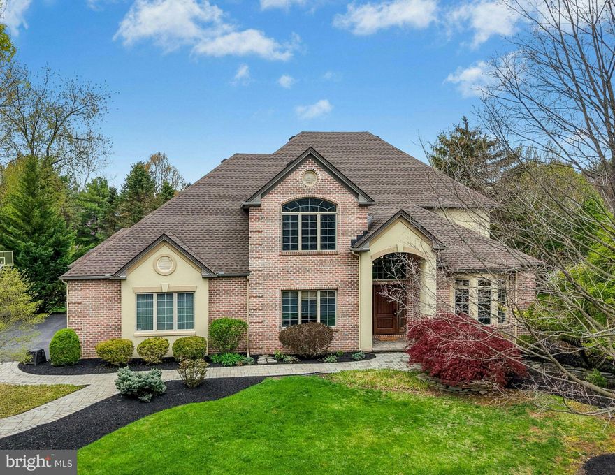This SOPHISTICATED HOME sits proudly on a generous HALF ACRE lot on a quiet road in the coveted neighborhood of Estates at Trexler Park. Located in the PARKLAND SCHOOL DISTRICT, this colonial offers luxurious updates with easy access to shopping, dining, and the Lehigh Valley's renowned hospital campuses. 
A soaring 2-story foyer welcomes you to this extraordinary home, with hardwood floors, extra wide crown molding, and oversized windows. French doors lead to a handsome home office, while the formal living room is sunny and bright, opening to the elegant dining room. Cooks will delight in the thoughtfully designed kitchen, with stainless steel appliances and gas cooking. The adjacent breakfast area leads to a deck with built-in pergola and views of the lush backyard. A coffered ceiling in the family room is accented by a gas fireplace with stone surround. A mudroom with built-in storage and powder room complete the first floor.
Luxury awaits in the upstairs primary suite, with a large bedroom complete with sitting area, dual walk-in closets, and oversized bath with jetted soaking tub. An additional suite is on this floor, along with two bright and sunny bedrooms joined by a shared bath. The finished lower level offers expansive space for a home theater, exercise room, and plenty of storage.
TREXLER PARK ESTATE offers a stellar location in close proximity to business parks, public and private golf courses, and the region's essential commuter routes.