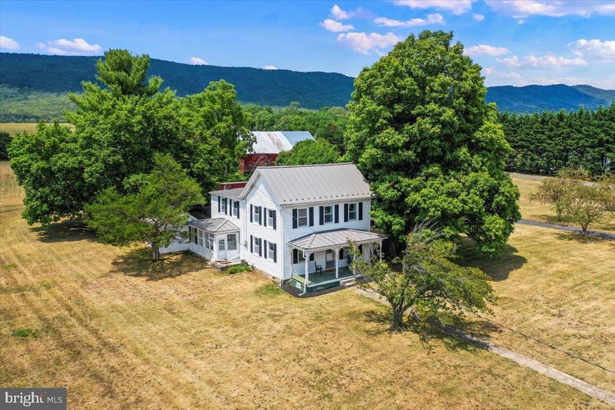 Discover Your Homesteading Dream with this 6 Acre Farmette featuring a remodeled 1860s Farmhouse waiting for its final touches!

Welcome to 12225 Back Rd, Toms Brook, VA - where historic charm meets modern comfort in this beautifully remodeled 1860s farmhouse with 1940s additions.  This exceptional property is set on 6.06 acres of scenic countryside and offers breathtaking panoramic views of rolling hills and lush landscapes.
As you arrive, you will be welcomed by a picturesque tree-lined driveway that guides you to this enchanting farmhouse. The exterior of the home features a brand-new roof and siding, providing both durability and a fresh addition to the aesthetic.
The interior of the home has been thoughtfully updated to combine classic elegance with modern amenities. You will find a new furnace and contemporary kitchen appliances that blend functionality with style. Additionally, the home boasts new plumbing and electrical systems, ensuring a reliable and efficient living environment. A whole-home water filtration system and accessories guarantees clean, filtered water throughout the house.
As you continue through the home, you will find a spacious and inviting living room, perfect for relaxing and enjoying the serene surroundings. The open and versatile space is ready for the new buyer to add their personal touches and make it their own. The updated kitchen is a fresh addition and the elegant dining area offers a great space for entertaining guests. Accessed from the enclosed porch, the summer kitchen is like taking a step back in time to the late 1800s. Outside, the 6.06 acres are ready to make your dream a reality - whether you envision a garden, a hobby farm, or simply a place to enjoy the natural beauty of the area, this property has you covered! The versatile barn is ready for your personal touch or agricultural endeavors. This picturesque view is in protected land (90 year conservation trust) - a view to be enjoyed for many years to come! Interested in making this home into an Airbnb? The process is easy, quick, and simple!
Located in the heart of Mt. Olive, with a Toms Brook address - rich in Civil War history, this farmhouse offers the tranquility of country living with nearby local shops, dining, and more. Numerous outdoor activities nearby as well - from hiking on the George Washington and Jefferson National Forests to rafting down the Shenandoah River, and everything in between! If you are seeking a peaceful escape from city life while still having the convenience of access to I-81 and Route 11, then look no further! The current owners have improved this property over the past two years - from thoughtful upgrades to land care, this home reflects their genuine attachment and love for the property. Unfortunately, relocation has given the need to sell this piece of history. This home is looking for a new owner to finalize the home to their taste and design. You would not want to miss out on this unique opportunity to own a piece of Toms Brooks charm. Schedule your tour today and see for yourself why this homestead dream is the perfect place to call home.

*In order to see all the great features that this property has to offer, please schedule your appointment today with your agent.

  **Highest and best offers will be reviewed on Tuesday 7/23 by 5PM.