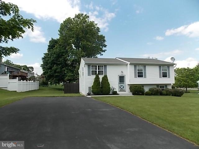 Move in ready, Pack your bags. Home has been meticulously maintained. Master bedroom has dual closet with private bath. Open area from dining room to kitchen. Kitchen has pantry and lots of closet space. Knee wall could easily be a breakfast bar. Huge deck off dining room with stairs to privacy fenced rear yard. Lower level has family room and space for more rooms. Side walk out is level .