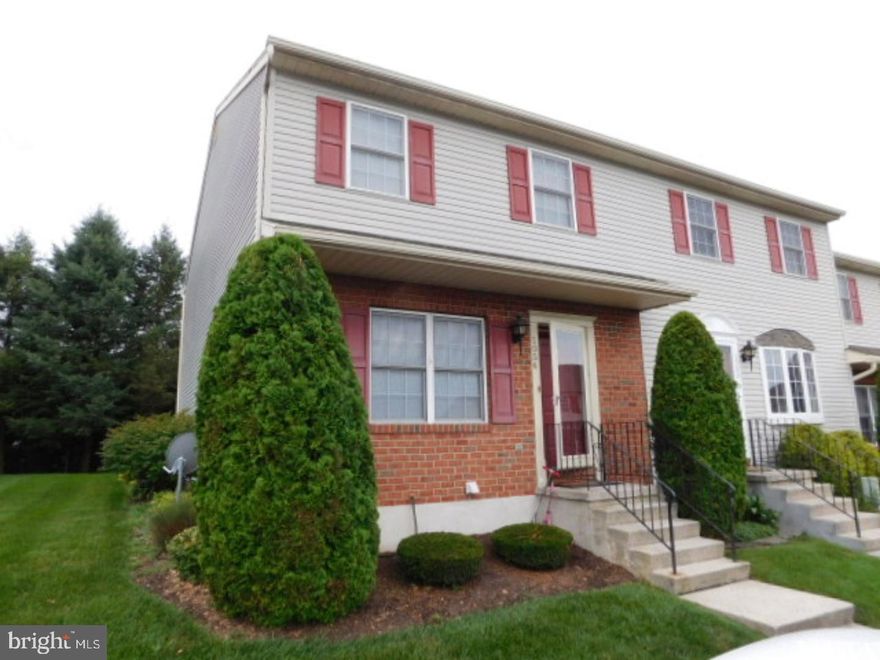 Immaculate brick front end unit townhouse in ideal location featuring 3 bedrooms, 2.5 baths with the master suite housing a custom roman style tile shower and double closets. Upgraded kitchen with double bowl sink and granite counter tops with viewing window to oversized dining room featuring marble chair rail and two tone paint. Large family room has access to deck and larger than normal private back yard. The lower level family room is finished yet still has plenty of space for storage and laundry room. All gas utilities, super low HOA fee of $75 and taxes under $3,100. This home is on the outer loop and backs to single family homes with little to no traffic. A must see in this development.