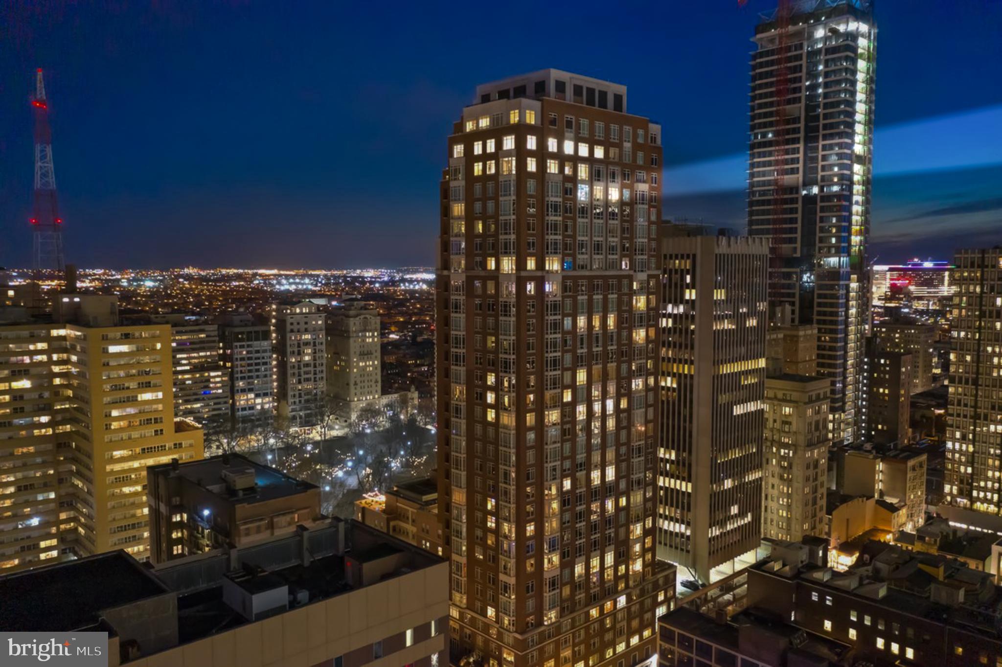 Experience 10 | Live at 10. Welcome to residence 3002, a high floor 3 bed 3.5 bath designer condo with knockout skyline views. This versatile split bedroom design offers the perfect flow and lifestyle. A large eat-in chef's kitchen balances practicality with sophistication and features white Poggenpohl cabinetry, an informal dining option, an oversized island, Subzero, Wolf and Miele appliances. Drift into the grand living space measuring over 25 feet wide with floor to ceiling windows. A flexible space with tremendous scale where you can have dinner parties or relax with your loved ones on a huge sectional. Enjoy your art collection displayed on expansive walls. Off of the main living room through beautiful shaker french doors you’ll find a 3rd bedroom (currently used as a den / office ) with an en-suite marble bathroom. On the west end of the condo you’ll find a lovely guest bedroom with two closets and an en-suite as well. This guest bedroom can function as a work from home space if preferred. A hallway separates the entertaining areas from the private sanctuary of the primary suite which features dramatic views, a pristine spa-like 5 piece marble bathroom, two walk-in closets (both fit out). 3002 has over 60 feet of skyline frontage and this floor has higher ceilings than almost any other in the building at roughly 10.5 Feet. A true 3 bedroom condo with plenty of versatility... an incredibly efficient layout and use of square footage. Robert A.M. Stern, the famed architect responsible for iconic buildings such as 520 Park Avenue, 220 Central Park South and 15 Central Park West designed a masterful building on our beloved Philadelphia park. Residents enjoy 5 star 24 hour service, a chauffeured driven town car, yoga room, gym, indoor lap pool, library, outdoor courtyard, board meeting room, piano lounge, TV lounge, climate controlled wine room, bike storage, catering kitchen, hotel guest suite, underground valet parking and most importantly a friendly and beautiful community. Philadelphia's TOP SPA, Rescue Spa has opened in the building for the ultimate convenient amenity! Pet friendly. ****** Located on prime 18th street where the best restaurants in town are at your finger tips. Pet friendly. One Storage unit included with this sale as well as One Parking License.