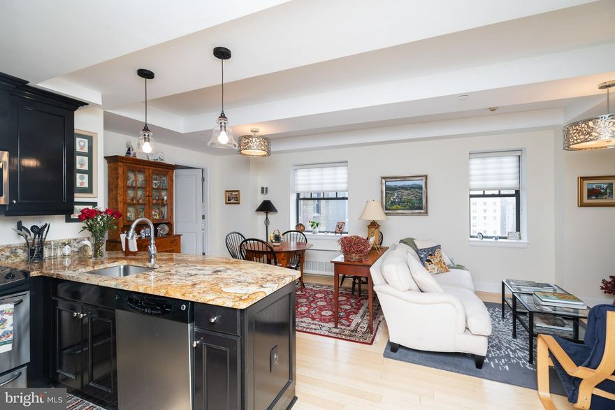 Meticulously maintained two bedroom, two and a half bathroom residence with high-end finishes and details at The Warwick Condominiums, steps from Rittenhouse Square. This spacious light-filled home offers sunrise city views from all rooms. The condominium features an open, split floor plan perfect for entertaining, while also providing the ultimate in privacy. Upon entering the home, you are welcomed into an expansive great room with a living room, dining room and chef's kitchen. The kitchen boasts dark wood cabinetry, granite countertops, GE stainless steel appliances and a breakfast bar with pendant lighting. 
The primary suite has a walk-in closet and ensuite bathroom appointed in marble with a deep soaking tub. The second bedroom also has a walk-in closet and ensuite bathroom appointed in marble with frameless stall shower. Additional home highlights include bamboo floors throughout, architectural ceiling details, a powder room and a stackable washer and dryer. Residents of The Warwick enjoy the same amenities as hotel guests including a 24-hour doorman; state-of-the-art fitness room; room service, maid service, valet parking and car service for an additional fee; and the convenience of three restaurants on the ground floor. Half a block from Rittenhouse Square, The Warwick provides easy access to all that Center City has to offer, including the Market Street office corridor,  Avenue of the Arts, Walnut Street shopping, Parkway museums and Amtrak's 30th Street Station.