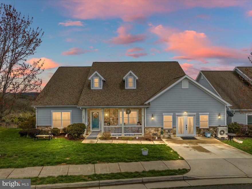 Nestled amidst the picturesque landscapes of Strasburg, this home offers a serene retreat from the hustle and bustle of city life, while still remaining close to amenities and convenient to 81 and 66. This beautifully updated home has an open concept kitchen/ living/ dining, a double sided stone fireplace, over 4400 finished square feet, a walkout basement, lower patio, a deck with stunning unobstructed mountain views, and a bonus room on the main level that could be an office or additional bedroom. The primary bedroom and large on suite bathroom has a walk-in shower as well as a soaking tub. The second bedroom has a connecting bathroom. And the third bedroom located in the basement has a connecting bathroom with an oversized walk-in closet. With the basement having it's own entrance, it could possibly be rented out or made into an in-law suite. The garage has been converted to a games room, but can easily be converted back. And the backyard is fully fenced in, waiting for your pets. The perfect home for entertaining as there are built-in speakers throughout the kitchen, living room, hallway, garage, primary bedroom and bathroom. Book your showing today and come see all Strasburg has to offer!