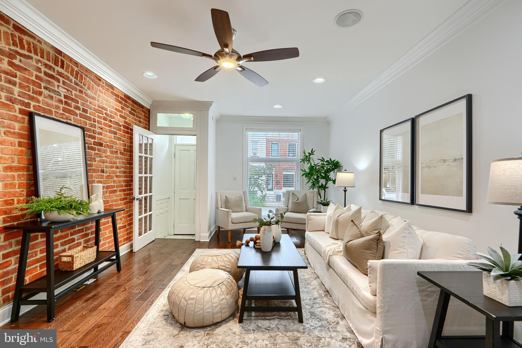Pride of ownership abounds in this turn key 4 bed 3.5 bath Canton home. You'll fall in love with the spacious main level, featuring hardwoods, chefs kitchen, custom trim, lighting, and convenient 1/2 bath. Venture upstairs to find a large primary suite with lovely bath and tons of closet space. Enjoy an ample sized 2nd bedroom complete with its own en suite bath. Relax on your well maintained roof deck. The lower level offers a family room, den/office , full bath or potential to for use as additional bedrooms. Prime Canton location with close proximity to shopping, dining, waterfront, 95 & 895. EASY dedicated PARKING pad!!