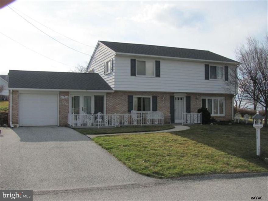 Well-maintained 2-story Colonial w/ 4BRS 1.5BA in Dallastown schools.  Features large rooms thru-out, insulated windows, CAC, newer heating system, open KIT & dining area, walk-in pantry, 1st flr LAU/half BA, den, large covered patio, shed, landscaping.  Close to Lake Redman Park & I-83.  A must see; don't miss this one!