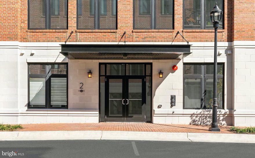 Absolutely gorgeous!!  Incredible location downtown Leesburg, walking distance to shopping, dining, parks, the W & OD Trail is steps away.  Two bedrooms, two full baths, gourmet kitchen, gas fireplace, 10" ceilings, CAT-6 wiring, and so much more!  This luxurious condo boasts one level living on the third floor with elevator and stair access.  The attached garage allows entry into the building.  The unit has a full size laundry, den, luxury owners suite with walk in closet, gorgeous bath with oversized shower.  There is a secondary bedroom with large closet, and another full bath.  Oversized windows allow lots of light and the patio off of the dining room is perfect for coffee in the mornings.