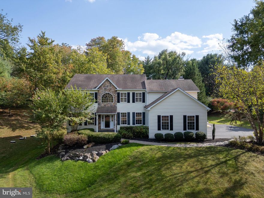 Out of a storybook, 182 Willits Way sits on a beautiful tree-lined street!   This expansive space of approx  5,500 square feet (3,800 on 1st & 2nd level plus an additional 1,700 sq ft in lower level)
is in an established and serene neighborhood nestled in the award-winning Garnet Valley School District. No stucco and No HOA fees!! 2 story foyer welcomes you in to cohesive hardwood flooring throughout all of the main floor. First-floor office to the right and formal living room to the left which then continues to the generous dining room.  Full eat-in kitchen with double oven and gas cooking connects to the vast family room with gas fireplace as the focal point.  An approx. 13 x 16 all-season Sun Room addition creates such a bright space for additional gathering or lounging. Upstairs you will find a spacious primary bedroom with sitting area, 2 walk-in closets, and a primary bathroom with a claw foot tub. A super convenient 2nd-floor laundry room is tucked away along with the additional 3 spare bedrooms and recently renovated full hall bathroom.The fully finished daylight walk-out lower level offers endless possibilities; it was expanded when the all season Sun Room was added. Currently, this space is used as 2nd family room, home office, AND huge home gym!
Both a  full and half bathroom add functionality to this already impressive lower level. Ample storage closets ensure everything has it's place. This lower-level space has 2 doors for coming and going.
Timbertech deck with stairs down to the rear hardscaped patio and private peaceful lot in the back.  3 car attached garage with convenient mud room as you step into the house. An extra added feature is the very convenient central vacuum system throughout the home. Nestled in the desirable Glen Mills area, this exceptional home offers proximity to excellent schools, parks like Martins & Newlin  Grist Mill, and shopping like Costco, Brinton Lake Shopping Center, and Concord Mills, catering to a luxurious lifestyle.  Just minutes away from the bustling borough of Media & West Chester for strolling and dining plus tax free shopping in DE.
Wawa Train  Station is less than a 5-minute drive away and Philadelphia Airport is within  25 minutes.  Don't miss this opportunity to own a piece of paradise! Schedule your private showing today.