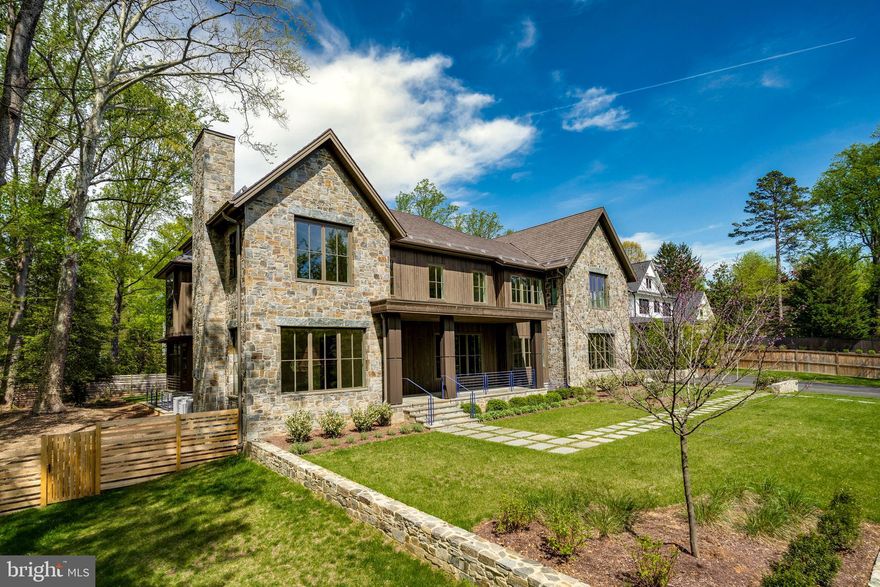 Presenting an extraordinary creation by award-winning architect John Katinas of Katinas-Bruckwick, masterfully executed by renowned homebuilder Paul Katinas. Located in the prestigious Longwood/Armat neighborhood of Bethesda, this one-of-a-kind residence redefines luxury, design, and quality. Perched on a private, approximately half-acre lot, this custom-built home offers over 9,000 square feet of exquisite living space across three levels, complemented by an additional 1,000 square feet of thoughtfully designed outdoor living areas.

Every inch of this residence is meticulously planned and executed, showcasing striking design, phenomenal attention to detail, and an array of modern amenities.

Main Level:  Step through a stunning foyer featuring soaring 22-foot ceilings and elegant white oak paneling that sets the tone for the home’s timeless sophistication. The bright and inviting formal living room with a custom fireplace lies to your left, while the dining room, enhanced by luxurious wallpaper, offers an atmosphere of refined elegance.

The heart of the home is the expansive gourmet kitchen, a chef’s dream outfitted with custom porcelain countertops and a top-tier Thermador appliance suite. The kitchen seamlessly connects to a great room adorned with warm oak paneling and abundant natural light. A "sun and moon"-themed powder room, elevator-ready closet, and the main staircase—featuring a stunning, commissioned art installation spanning all three levels—round out the main floor.

Practicality meets luxury with an oversized three-car garage that leads to a custom-designed mudroom, a second themed powder room, a private office, and a secondary staircase for easy access to all levels.

Upper Level:  The upper floor houses five beautifully appointed en-suite bedrooms, including the spectacular primary suite. This serene retreat features vaulted ceilings, a custom concrete-paneled fireplace, a spacious walk-in closet and dressing room, and a breathtaking spa-inspired bathroom.

Each additional bedroom boasts a unique design, with bespoke paneling, intricate ceiling details, and state-of-the-art fixtures and tiles.

Lower Level:  The lower level is an entertainer’s dream, with a recreation room complete with a sleek bar, a flexible open space for gatherings, and a wellness room ideal for a yoga studio or home gym. Adjacent is a state-of-the-art spa featuring a steam and jets room, cold plunge bath, sauna, heated floors, titanium fixtures, and a custom-molded sink. An additional bedroom suite offers privacy for guests or family members.

Outdoor Living:  The private backyard is a serene oasis, featuring a screened porch with a cozy fireplace and a patio perfect for entertaining or relaxation. The lot also accommodates a future pool if desired.

Unmatched Craftsmanship:  This home boasts premium materials and finishes throughout, including copper piping, galvanized iron sewer lines, open-cell spray foam insulation, a sophisticated Lutron lighting system, pressure-treated brushed cedar exterior siding, EVR air circulation systems for healthy living, built-in speakers, and titanium bathroom fixtures. Every element is designed to deliver unparalleled quality, comfort, and longevity.

Experience the Pinnacle of Luxury:  This is more than a home—it’s a statement of modern luxury and exquisite design. Don’t miss the opportunity to experience this architectural masterpiece in person.