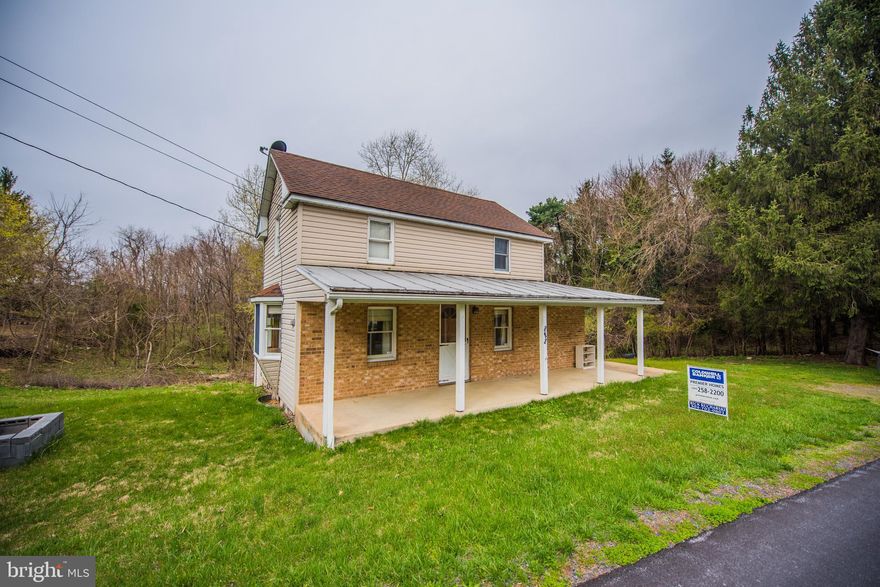 Near town,  Well kept farm house is just 1/2 mile from town, nice yard setting, newer roof and furnace, enclosed porch, Nice open front porch for those peaceful evenings. Plenty of room for the small family or perfect with downsizing in mind.