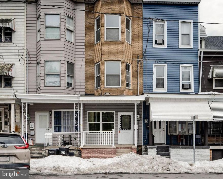 Welcome to 724 E. Centre St, Mahanoy City, PA — a beautifully restored residence where thoughtful design meets exceptional craftsmanship. This fully renovated home showcases high-end materials, meticulous attention to detail, and a seamless blend of modern luxury with timeless charm.
Step inside and you’re immediately welcomed by a spacious living room adorned in warm, inviting tones that create a sense of comfort and sophistication. The space flows effortlessly into the true centerpiece of the home — a magnificent chef’s kitchen featuring a walk-around island, striking granite countertops, custom cabinetry, bright recessed and pendant lighting, and premium finishes throughout. Designed for both functionality and entertaining, this kitchen is as impressive as it is practical.
Just beyond the sunroom, you’ll find a convenient half bath, perfectly positioned for guests and everyday use.
Upstairs, the second floor offers three private bedrooms and a beautifully finished full bathroom with refined finishes and elegant design. Continue to the third level where two additional private bedrooms provide flexibility for a growing household, home office, or guest quarters — offering a total of five bedrooms.
Outdoor living is equally inviting, with a rear deck ideal for entertaining and relaxing. The property also features off-street parking with a dedicated parking pad — a valuable and convenient addition.
The lower level presents exceptional opportunity. With full egress access in and out of the home, the basement offers the potential to be transformed into additional living space, recreation area, or extended suite — allowing the next owner to further customize and add value.
This is more than a renovation — it’s a complete transformation executed with care, quality, and vision.
Schedule your private showing and experience the craftsmanship of 724 E. Centre Street for yourself.