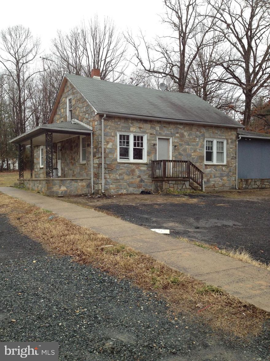 Zoned M-1 with all allowable uses. Please verify with Stafford County. Level lot with existing home-office for your business. Potential redevelopment to a 9000 sf warehouse or truck parking.