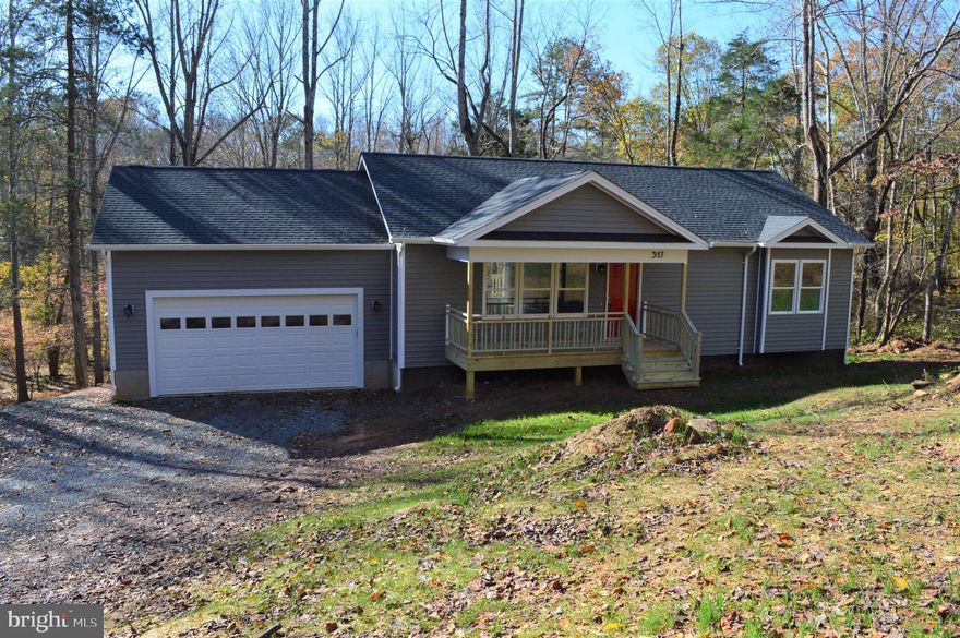 JUST REDUCED AND MOVE IN READY! Beautiful New Construction home located in Moonshine Mountain Community on the Robinson River. Enjoy the walking trail leading to the river from your back yard. Walking  into the home on the main level from the covered front porch you will find an open floor plan into the living room which flows into the kitchen/dining area. Upgraded features include granite counter tops, kitchen island, 10 X 10 deck off of kitchen/dining area, 24 X 22 finished garrage with 8' tall garage door. For future expansion, Basement will include a full finished bathroom. Call for more information.