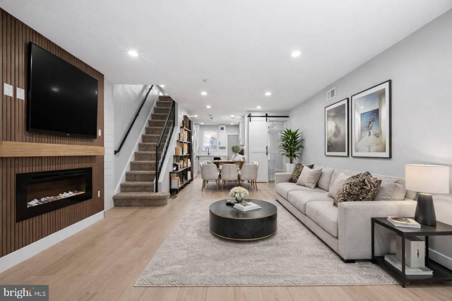 Welcome to this beautifully renovated and thoughtfully designed 2-bedroom, 1.5-bath home in the heart of South Philadelphia. Completely rebuilt from the shell inward, this property offers peace of mind with all-new plumbing, electrical systems, framing, water and gas lines, sewer line, windows, and doors.

Enjoy year-round comfort with a brand-new high-efficiency HVAC system and hot water heater. Inside, you’ll find new flooring throughout, recess lighting,  a modern kitchen featuring quartz countertops with a full-height backsplash, a built-in fireplace, and updated bathrooms with high-quality finishes. The upstairs bathroom includes a premium bidet upgrade for added comfort.

Additional upgrades include a new electrical panel and service line, brand-new appliances, and a convenient second-floor laundry area with a 2-in-1 washer and dryer. The home also features new insulation throughout, fresh exterior siding in the rear, and a clean, full basement—ideal for storage or potential additional living space.

All renovations were completed with proper permits and have successfully passed city inspections. Situated on a desirable block in vibrant South Philadelphia, this move-in-ready home seamlessly blends quality craftsmanship with modern convenience.