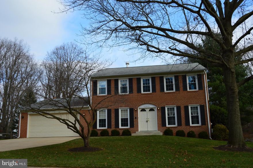 Wonderful Heiser Colonial  in a sought after neighborhood in Cloverly.  Glistening Hardwood flooring,. Both bathrooms upstairs have double sinks and bathtubs. Spacious floor plan with family room w f/p off the kitchen and door out to the back yard patio and fenced backyard.  Full unfinished basement with room to make it your own space..  Windows have been replaced, appliance updated. Cul-de-sac