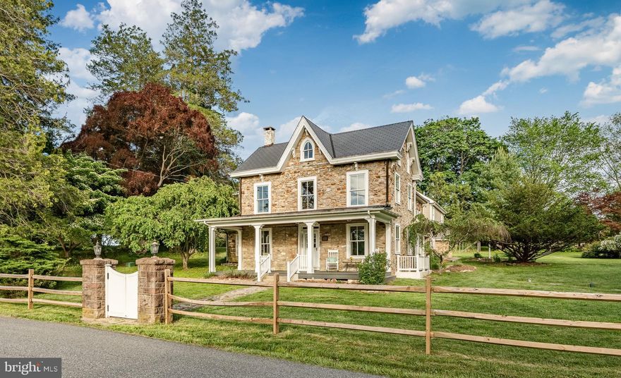 Welcome to Fieldstone Manor, a captivating circa 1850s residence that blends 175 years of history with the comforts of modern living. Located in the heart of scenic Chester Springs, this meticulously maintained homestead offers charm, character, and privacy on just over 3 acres (including both parcels) of rolling countryside. The property includes the main home, a massive  6,500sqft barn (that is a historical asset for West Pikeland township), a workshop, ruins from an old springhouse, and grounds that are park-like with specimen trees. A recent expansion connects to the original home via a breezeway to additional living space tailored to fit your lifestyle. The oversized flex room in the addition is a versatile bonus—perfect as a 5th bedroom, in-law suite, home office, playroom, gym, or creative studio. Other recent upgrades include a beautifully restored barn exterior. A full list of home and barn improvements are included in the documents! Whether relaxing on the welcoming front porch, enjoying morning coffee in the stone courtyard, or entertaining on the private grounds, multiple outdoor living areas offer stunning pastoral views and peaceful serenity. Surrounded by horse farms, parks, and picturesque back roads, Fieldstone Manor is a rare opportunity to own a piece of Chester Springs history (this enchanting property once lay along the historic Conestoga Turnpike!). Discover the perfect blend of timeless elegance and modern functionality in this extraordinary home. Don’t miss your chance to see this unique and charming retreat!