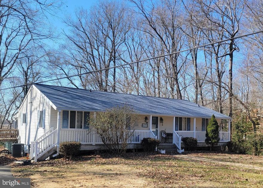 Do not walk out on walkaway to pier. Not safe. .  This is Waterfront on the Patuxent 4.37 acres its 2 lots together cant be separated . It has an inground pool the liner is new as of last year. The roof was put on in the last few years. 
2 bedrooms and 2 bath upstairs. It has a living room in the front of house. The kitchen has a dining room off of it. There is a screen porch the length of the home in the rear. There is a handicap ramp in the rear to enter the home thru the bedroom slider on the porch. There is a handicap bathroom upstairs as well.