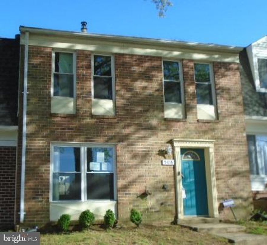 Brick front townhouse, laminate floors, newer kitchen cabinets with granite counter top, fenced yard, updated bathroom. Property is sold AS IS.