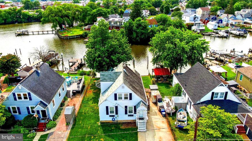 Waterfront Opportunity with Income Potential!

Welcome to 533 Bayside Dr, a unique waterfront property in Dundalk offering scenic views, direct water access, and endless potential to customize to your lifestyle. Situated along the water with its own Trex-built dock, this home is perfect for boating enthusiasts. The deep water access can accommodate larger vessels, and there's room to easily add a boat lift—so you can enjoy hassle-free outings without constant launching and hauling.

Venture out back to a spacious porch overlooking the water, ideal for morning coffee or weekend entertaining. Inside, the main level features 1 bedroom and 1 full bathroom, with a sliding glass door in the kitchen that fills the home with natural light and showcases beautiful water views.

The unfinished basement includes a half bath and walk-out access to the backyard—perfect for creating additional living space, a workshop, or a rec room tailored to your needs.

Upstairs, you'll find a fully updated studio apartment with its own kitchen and full bath, renovated just two years ago. The private setup—with the interior stairs blocked for privacy—has been rented to a long-term, reliable tenant who always pays on time. Keep it as a studio rental to offset your mortgage, or easily convert the space back into 2-bedrooms.

The home also offers a fenced-in yard, a gated driveway with parking for two cars, and ample street parking for guests. As a resident, you’ll have access to the Civic League of Inverness, which includes a private park and boat ramp—membership is just $20/year, with ramp access for only $10/year.

Yes, this home needs some updates and the seller wants to sell AS-IS, but it’s your chance to design the perfect waterfront lifestyle exactly how you want it—live, rent, boat, and build equity all in one place.