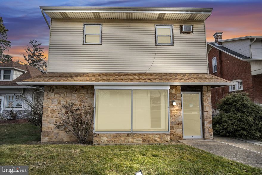 This mixed-use asset in Camp Hill Borough offers approximately 2,500 sq ft and a flexible layout well suited for a variety of investment or owner-occupant uses. The front of the property features a commercial office or business space with strong visibility along a high-traffic main road. The interior includes 4 bedrooms, 2 full baths, and a large bonus room that can serve as additional living, office, or work space. Recent improvements include new carpet, fresh interior paint, updated light fixtures, fully remodeled bathrooms, and new kitchen appliances. A walk-out basement provides additional space and storage. The property also features an oversized attached garage with extra storage and paved off-street parking in the rear. The layout and location offer flexibility for a range of residential and commercial use options.