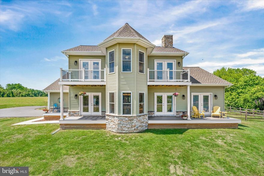 Welcome to 4611 Augustine Herman Hwy – an exceptional custom-built home offering breathtaking water views of the Bohemia River and an unparalleled blend of comfort, beauty, and luxury.

As you step inside, you’re welcomed by an atmosphere of warmth and natural light, enhanced by 9-foot ceilings and bamboo flooring that flows seamlessly throughout. At the heart of the home is a large open-concept kitchen, equipped with new stainless steel appliances, a spacious island, and an abundance of cabinetry—a true chef’s dream. The kitchen flows effortlessly into a generous living area with direct access to the front deck, ideal for relaxing or entertaining with a view.

The home features four bedrooms, including an updated main-floor primary suite. This retreat boasts a spa-inspired en-suite bathroom with heated tile flooring, a custom-tiled walk-in shower, and a walk-in closet with built-in organizers, creating a truly serene and organized space. Upstairs, you'll find three additional bedrooms, a full hall bath, a second-floor family room, and a versatile bonus room, perfect for a home office, playroom, or guest space.

The home has seen numerous high-impact upgrades, including a brand-new roof, new Trex Select decking, ScreenEze system with railings around the back deck, a new garage door and opener (2022), a Culligan water system with reverse osmosis for drinking water (2022), a new pressure tank (2022), and new front door and French back doors.

The exterior is equally impressive, showcasing a large fenced yard perfect for outdoor activities. Elevated for maximum views, the home offers majestic view of the Bohemia River from nearly every room.

Additional highlights include an EV PowerPro electric car charger, whole-house generator, full basement, and a massive driveway with ample parking for multiple vehicles.

Ideally located just minutes from Middletown, Delaware, the 301 Bypass, Sassafras and Bohemia Rivers, restaurants, marinas, and a public boat ramp—this home is a rare opportunity to enjoy a vacation lifestyle every day, with the perfect balance of serenity and convenience.