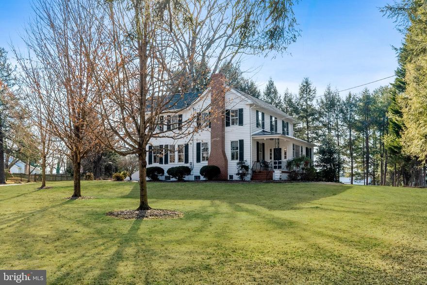 Welcome to “The Meadows” an  enchanting piece of history nestled on 1.26 acres of picturesque  setting in Severn.   Ideally situated for commuting proximity to BWI, Annapolis, Fort Meade, Baltimore, and DC.  Built in 1864, this meticulously renovated farmhouse seamlessly blends the charm of yesteryears with modern conveniences, offering a truly unique living experience.

As you enter the property, you are greeted by a fully fenced yard and a charming circular driveway adorned with a majestic flagpole. The park-like setting invites you to explore the tranquility of the surroundings, while the detached two-car garage provides ample space for your vehicles and storage needs.

Step inside to discover the timeless elegance of this home. The main level features a spacious bedroom guest suite with a private entrance, perfect for accommodating guests or creating an in-law suite. With a total of four bedrooms and two home office nooks, there is plenty of space for work, relaxation, and entertainment.

The sunroom entrance exudes warmth and invites you to bask in the natural light, while the elegant foyer showcases a beautiful baby grand piano, setting the tone for gracious living and memorable gatherings.

Whether you're savoring quiet moments on the porch swing or hosting lively gatherings in the expansive backyard, this property offers endless opportunities for enjoyment and relaxation.