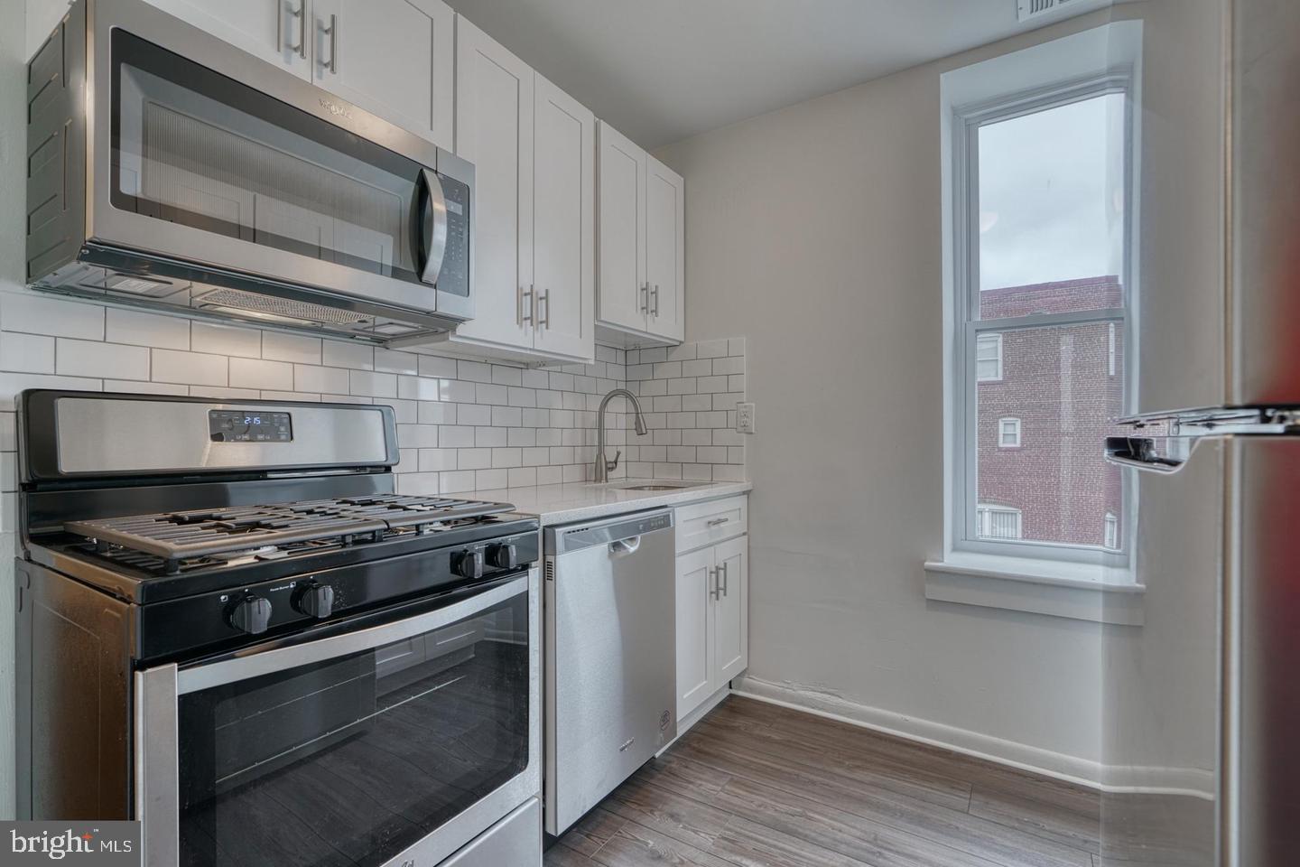 Welcome to the highly sought after historic community of Reservoir Hill! This charming multi-dwelling home consists of 3 newly renovated units, with 3 bedrooms and 1 bathroom in all! This spacious unit features high ceilings, hard wood floors, updated stainless steel appliances, central air, and in-unit washer and dryer. Minutes from Downtown Baltimore, the Baltimore Zoo and Druid Hill Park, with I83 providing access to Shopping Centers, Restaurants and major access routes. Easy access to public transportation, including Metro Subway, Light Rail and buses.