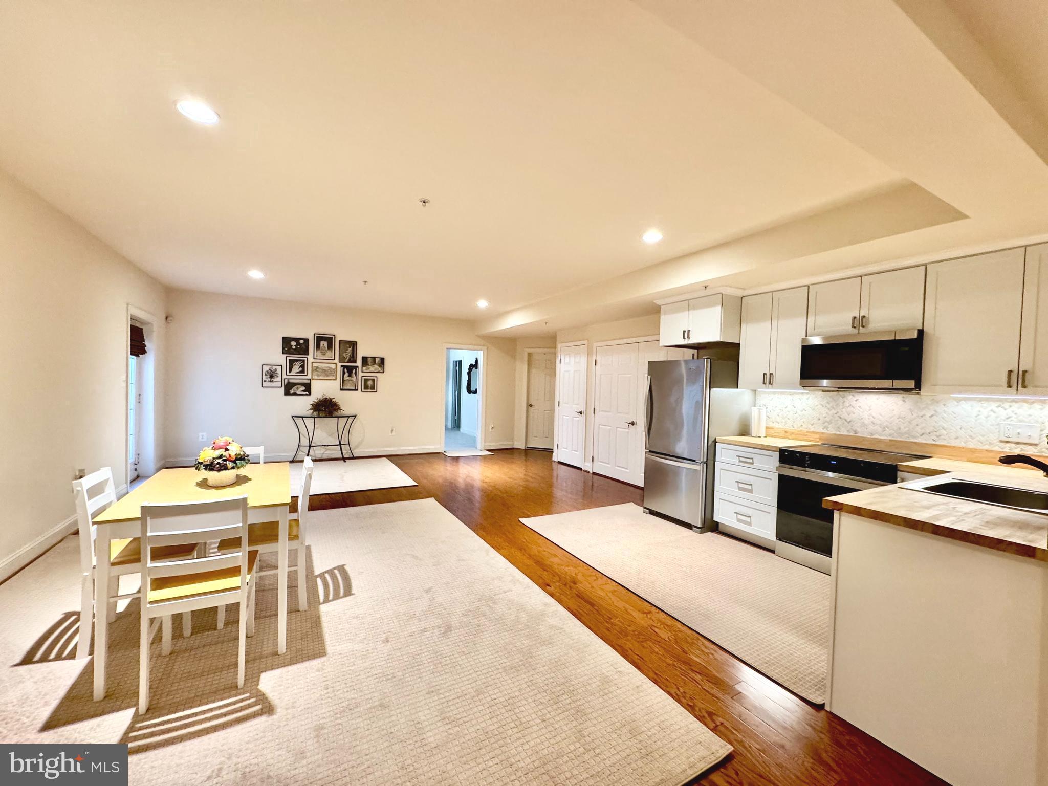 FULLY FURNISHED DWELLING WITH ALL UTILITIES INCLUDED —a unique basement dwelling within a stately single-family home that redefines comfortable living. This expansive unit features a generously sized bedroom and a pristine bathroom. The brand-new kitchen is outfitted with state-of-the-art appliances and sleek cabinetry. The open living room, adorned with freshly installed hardwood floors, creates an inviting atmosphere ideal for both relaxation and entertainment. With dedicated laundry facilities and a private walkout leading to exterior stairs, this residence offers an effortless blend of indoor comfort and outdoor accessibility, all within a fully fenced setting. Generously larger than a typical apartment, every detail has been thoughtfully curated to offer abundant space and a welcoming ambiance. Additionally, all utilities (except cable TV) are included, ensuring a hassle-free, all-inclusive living experience. Discover the perfect balance of luxury and practicality in this one-of-a-kind basement home, where modern design meets exceptional value. Ideal for 1 or max 2 persons with 1 car. Posted rent is for a single person, price may vary for 2 people, and on a case-by-case basis. Strictly no pets. No smoking.
