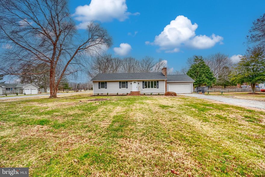 Beautifully renovated 3-bedroom, 2-bath rancher set on nearly an acre on a flat corner lot. This impressive home offers an attached 2-car garage, a spacious screened-in porch, and a deck overlooking a fully fenced backyard. Recent updates include new siding and a new roof for peace of mind. Inside, the inviting living room showcases a striking stone accent wall with a cozy wood stove. Hardwood floors and fresh paint extend throughout the home. The brand-new kitchen features stylish two-tone cabinetry, quartz countertops, and new stainless steel appliances. A fully renovated hall bath serves the secondary bedrooms, while the primary suite boasts a remodeled en-suite bath with a tiled shower and double vanity.  Located in a community just off the Wye River, this home offers the best of Eastern Shore living. Enjoy nearby waterways, nature, and small-town charm. Schedule your showing today and experience all this beautiful property has to offer.