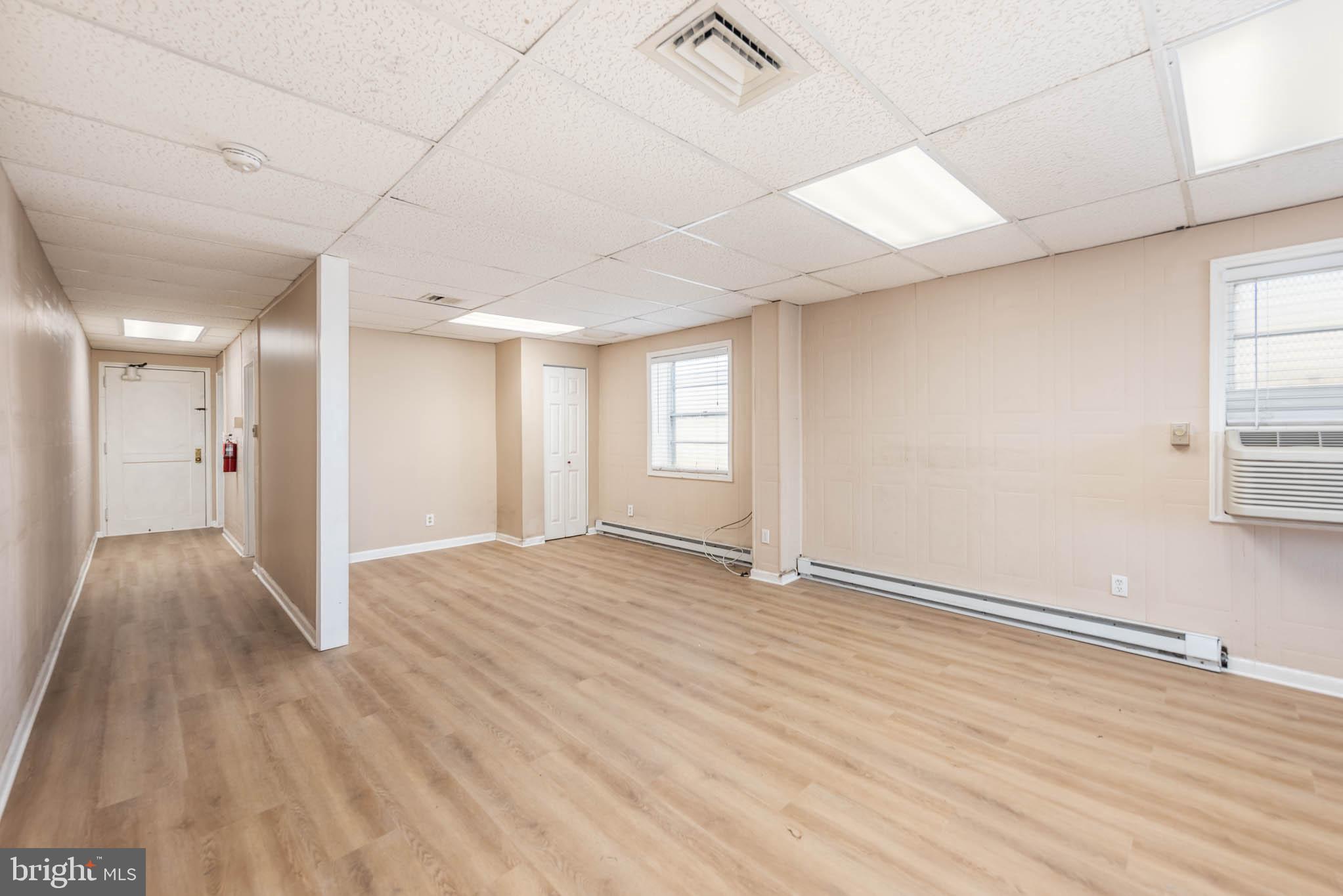 PRIME COMMERCIAL RETAIL OR OFFICE SPACE - EXCELLENT SIGNAGE - This ground level unit is located on Pulaski Highway in Rosedale. It offers excellent signage. Estimated 650 square feet. Tons of parking. 60 shared parking spaces. Unit has air conditioning and heat. This space has a full kitchen and powder room. New LVL flooring just installed. Ready for immediate occupancy. Tenant pays electric. Triple Net Lease - CAM approximately $200/mo