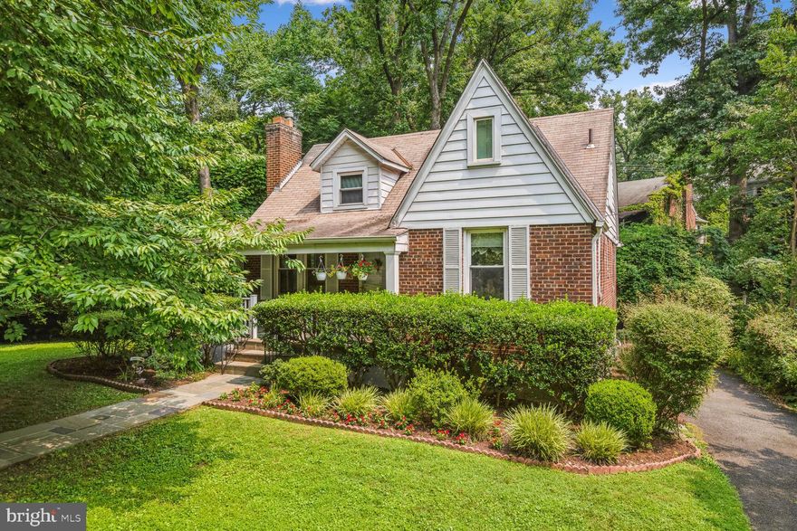 Welcome to this pristine brick Cape Cod in a most desirable North Takoma Location, just blocks to schools, library, downtown Silver Spring, Old Town Takoma and 1/2 mile to METRO.   The house has been lovingly updated and maintained  by the current owners of over 51 years!  Many updates include a 3-season rear sunroom addition and Trex deck, central air conditioning, a gas fireplace insert, replacement windows throughout, and a main level bath with heated floors.  Enter from the lovely landscaped yard via a  handsome slate walkway to the inviting front porch, also with slate flooring .  The living room features a gas fireplace with sidelight windows and beautiful original hardwood oak floors.  A large antique mirror over the fireplace conveys, if desired.  A separate  and spacious dining room leads to the renovated kitchen with built-in corner table +storage unit, and plenty of cabinets in a very functional layout.  The private sunporch is shaded by mature trees and features luxury vinyl flooring.  You will never know you are just blocks to the thriving center of town while relaxing out here! The wicker cabinets can also convey.  Also on this level are two bedrooms (one currently used as an office) and a recently renovated full en-suite bath with heated floors.  Upstairs are two more bedrooms, one with a walk in closet and cedar lined attic closet, the other very large bedroom with attic access as well. There is a full hall bath between these bedrooms. The lower level walkout is finished with a built-in desk and shelving unit for office, plus plenty of space for family room/guest/play space and a half bath, a separate laundry room and  storage room.   A very pretty side yard abuts a county easement: this land will never be developed and affords a great deal of green space and privacy.   0.6 mile to METRO.  About 1 mile to Silver Spring Metro.  Fabulous location, Adorable House!!!