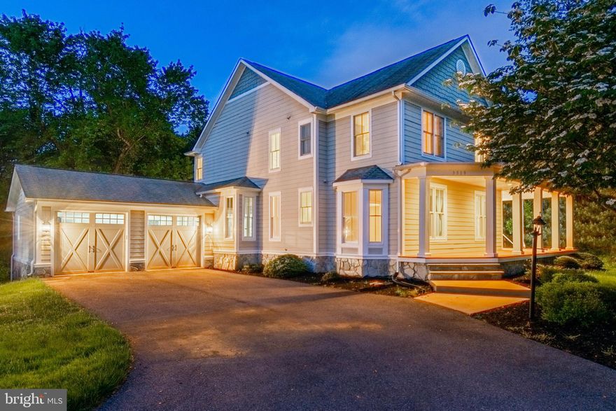 WARM & INVITING 3,300+ SQ. FT. COLONIAL THAT OFFERS THE ULTIMATE MIX OF LANDMARK CHARM AND MODERN AMENITIES!  The main level features a formal living room with a wet bar, separate dining room with gleaming hardwood floors, an expansive eat-in island kitchen with granite counters and no shortage of cabinet space and leads to the family room with a gas fireplace,  a bonus room that is perfect for an office or even a 5th bedroom, and a half bath.  The upper level offers a generously sized Primary bedroom suite with vaulted ceilings, dual walk-in closets, and a spa bath with a large soaking tub and separate shower.  In addition to the  owner's suite, there are an additional 3 bedrooms and 2 full baths.  The full unfinished basement is perfect for storage or can be finished to add more living space.  Additional features include an audio system throughout the main level, low maintenance Trek wraparound porch, a rear covered porch which is perfect for entertaining, and a convenient 2 car garage with plenty of additional driveway parking.  The property is located on almost 1 acre of land, backs up to Patapsco State Park, and is located a few short minutes from Historic Ellicott City main street.  This property will impress your most discerning buyers!