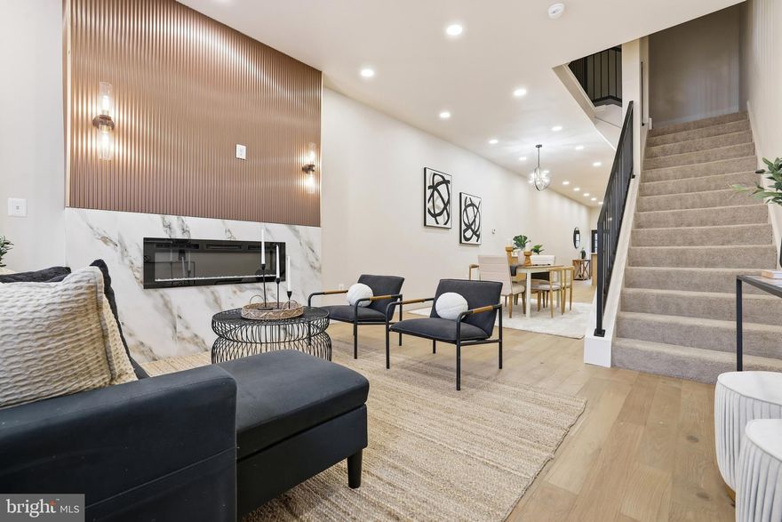 Welcome to 713 E. 20th St.—a beautifully reimagined home in the heart of Baltimore.
This stunning 4-bedroom, 2.5-bath renovation blends modern style with everyday comfort. Just minutes from Baltimore’s top attractions and a quick 5-minute trip to Penn Station, this location delivers both convenience and lifestyle.

Step inside to an open, airy layout designed for entertaining and effortless living. Enjoy a private parking pad, privacy fence, sleek stainless steel appliances, and a wine refrigerator perfect for the aficionado. Cozy up by one of the two fireplaces or escape to the dream-worthy primary suite featuring a spa-inspired bathroom you’ll never want to leave.

Completely renovated from top to bottom with all-new systems, this home is grant eligible and priced to allow the next homeowner to step into instant value and potential equity.