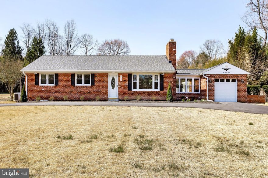 Beautiful home in Sherwood Manor. This stunning Bowie gem sits on a spacious 0.86-acre flat lot with circular driveway and brick exterior. The open concept kitchen with granite countertops features a unique white backsplash that blends matte and polished finishes for a striking, elegant look. The contrast adds depth and sophistication, creating a stunning focal point that enhances natural light and suits both modern and clasic styles. A large island, ample cabinet space with spacious pantry, and brand-new stainless steel appliances complete the space. refinished hardwood floors throught add warmth, while two fireplaces create a cozy gathering space. The finished basement boasts durable luxury vinyl flooring, and the laundry room includes a brand-new washer and dryer for extra convenience. Enjoy a brand new roof, attached garage, and a breezeway that doubles as a mudroom or extra space. Three bedrooms, a primary ensuite, blend comfort and modern convenience. A versatile free-standing building offers endless possiblities as a workshop, hangout area, or she-shed. Located near Route 301, Route 50, shopping, dining and highly saught after school (Yorktown Elementry & Samuel Ogle Middle) this home offers unmatched convenience in a highly desirable secluded neighborhood -with no HOA! Don't miss this rare find- schedule your showing today. Seller may consider buyer concessions if made in offer