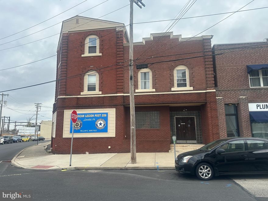Located in the heart of Lansdale Borough’s vibrant Business District, this exceptional 10,350 square foot, three-story commercial property offers a rare opportunity for investors, developers, or owner-users seeking flexibility and long-term upside. Currently occupied by the American Legion Post, a long-standing community presence, the building sits on a 0.18-acre lot and includes 23 on-site parking spaces—an invaluable feature in a walkable downtown setting. The property’s size, layout, and zoning allow for a wide range of permitted uses, making it ideal for continued institutional use, professional offices, retail, or a creative redevelopment into a mixed-use concept.

Positioned just minutes from the SEPTA Lansdale/Doylestown Line with direct access to Philadelphia, this location offers strong commuter appeal and accessibility. Surrounded by local shops, dining, and ongoing revitalization, the property is well-situated to capitalize on Lansdale’s continued growth. Whether you envision maintaining its current use or transforming it into a dynamic residential and commercial destination, this is a unique opportunity to secure a prominent footprint in one of Montgomery County’s most active boroughs.