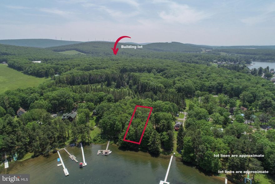 Lakefront lot AND 2.5-acre wooded lot. A rare dual-lot package that's the perfect combination for your mountain lake lifestyle. Opportunities like this are nearly impossible to find.