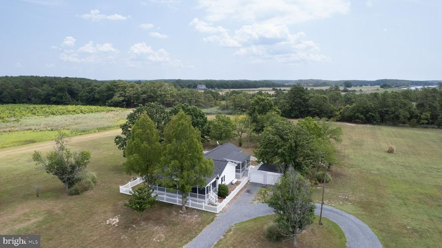 If you like wildlife, this is the property for you!  Deer come right to your back steps and eat out of your hand.    Original 1988 Nanticoke home on 20.40 acres with 3 bedrooms and one bath, separate laundry room, freshly painted and cleaned.  Addition from the kitchen with  2 bedrooms and one bath could be used for in-law suite, guest quarters or just extra room.  Two heat pumps, electric baseboard back-up heat, fenced yard, circular driveway with 3 LED auto lights and front and side porches to relax.  Detached shed.  List of recent updates and items replaced are available at agents office.  Waterfront lot on Taylors Island Road next to County Dock is included in the sale.  Lot is .82 acres with electric and has 260' of bulkhead.  Please contact Planning & Zoning to determine potential uses.