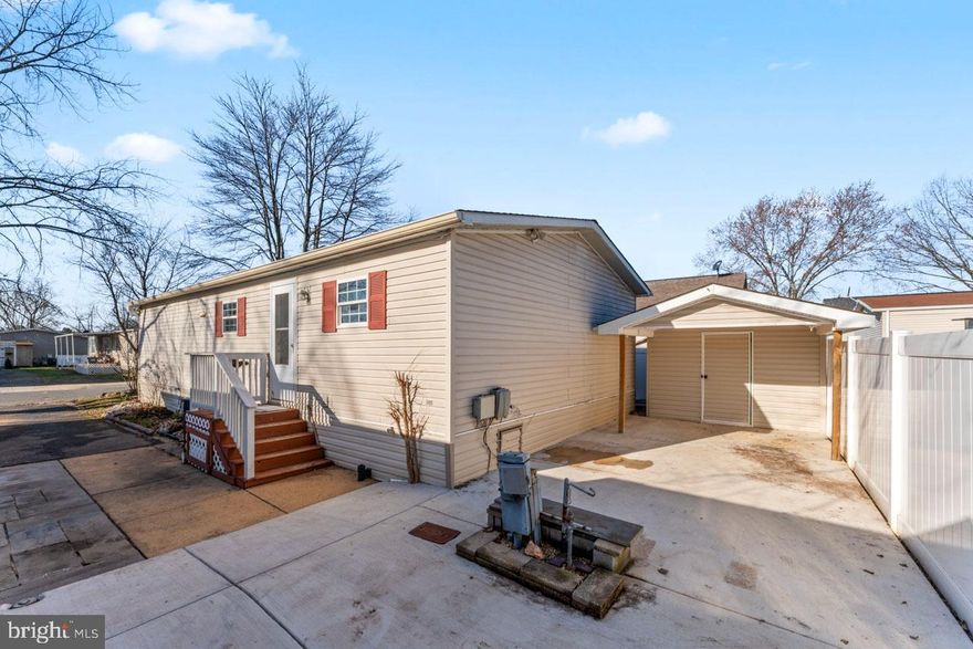 Move in ready manufactured home. Clean and well maintained throughout.  3 Bedrooms and 2 bathrooms.  Primary suite with a private ensuite bathroom with bathtub and a walk-in shower. The kitchen is spacious with tile backsplash and tons of cabinetry. Just off the kitchen is the laundry room housing a full-size washer & dryer, as well as walk-out access to the side deck! This home also offers a large shed for storage and an extended driveway for prime parking. Meadows of Chantilly is a Manufactured / Mobile Home Community where the home is owned and where the lot is not owned but on a "Leased Lot". The monthly Lease Lot payment is $1,655 and includes amenities as the community pool, club house, tot lots, snow removal. Super convenient location just off Rt 50 with close proximity to Rt 28, Dulles Airport, the Toll Rd and much more!