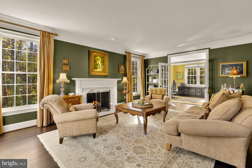 Welcome to 1257 New Bedford Lane, just 8 miles from Dulles International Airport, it’s a gracious, fully renovated home with six-full sized bedrooms, 5 full size bath and 2 half bathrooms, all with wooden floors throughout. It’s tucked at the end of a quiet cul-de-sac surrounded by mature trees and natural beauty. 
 
   •   From the moment you arrive, this home feels special. The classic brick façade, private wooded backdrop, and abundant natural light create a perfect blend of elegance and warmth.

   •   MAIN LEVEL:
Step inside a two-story foyer that opens to a beautifully proportioned elegant living room with gas fireplace and a dining room, ideal for both large and small gatherings. 
The heart of the home is the sun-filled family room where vaulted ceilings, and large windows provide all day sunlight.  An open stone fireplace invites you to relax with a cozy wood burning fire
during the winter months. French doors open to a spacious deck overlooking the  backyard, an ideal spot for morning coffee or entertaining with wood burning chimney for cooler evenings.
A spacious private office with bay windows overlooking the wooded area and large powder room complete the main level with the kitchen.

   •   KITCHEN:
The kitchen is designed for both style and function with granite countertops. Viking appliances, Sub Zero Fridges & Freezer, custom cabinetry, instant hot water & water filter, sensor faucet and a
cheerful breakfast area framed by large walk out glass doors that lead to the south facing deck. The kitchen leads to a convenient laundry room & closet and a custom 2 car garage.

   •   UPPER LEVEL:
Upstairs, the primary suite feels like a private retreat with a sitting area, his and hers dressing rooms, a spa-inspired marble bath, separate toilets, large shower and generous closet and storage space.
Three additional full bedrooms with storage closets, and two baths (one is  Jack & Jill) ensure access for all bedrooms & plenty of room for family and guests.

   •   LOWER LEVEL:
The walk-out lower level provides wonderful flexibility with two large primary bedrooms,  a large recreation room with gas fireplace, a fitness area with a half bath, a cedar wine cellar and two full
sized storage areas. It is the perfect setting for game nights, movie marathons, chill weekends or hosting out-of-town visitors.

   •   OUTDOORS:
Enjoy outdoor living from the upper deck or the covered patio below, surrounded by mature trees and peaceful views. Located just 2 miles from Reston Town Center with a host of good
restaurants, Wiehle & Reston Metros, several lakes with scenic running & walking trails, 18 outdoor pools & 48 Tennis courts.

   •   This home offers the best of both tranquility and convenience in one of Reston’s most desirable and sought after neighborhoods.