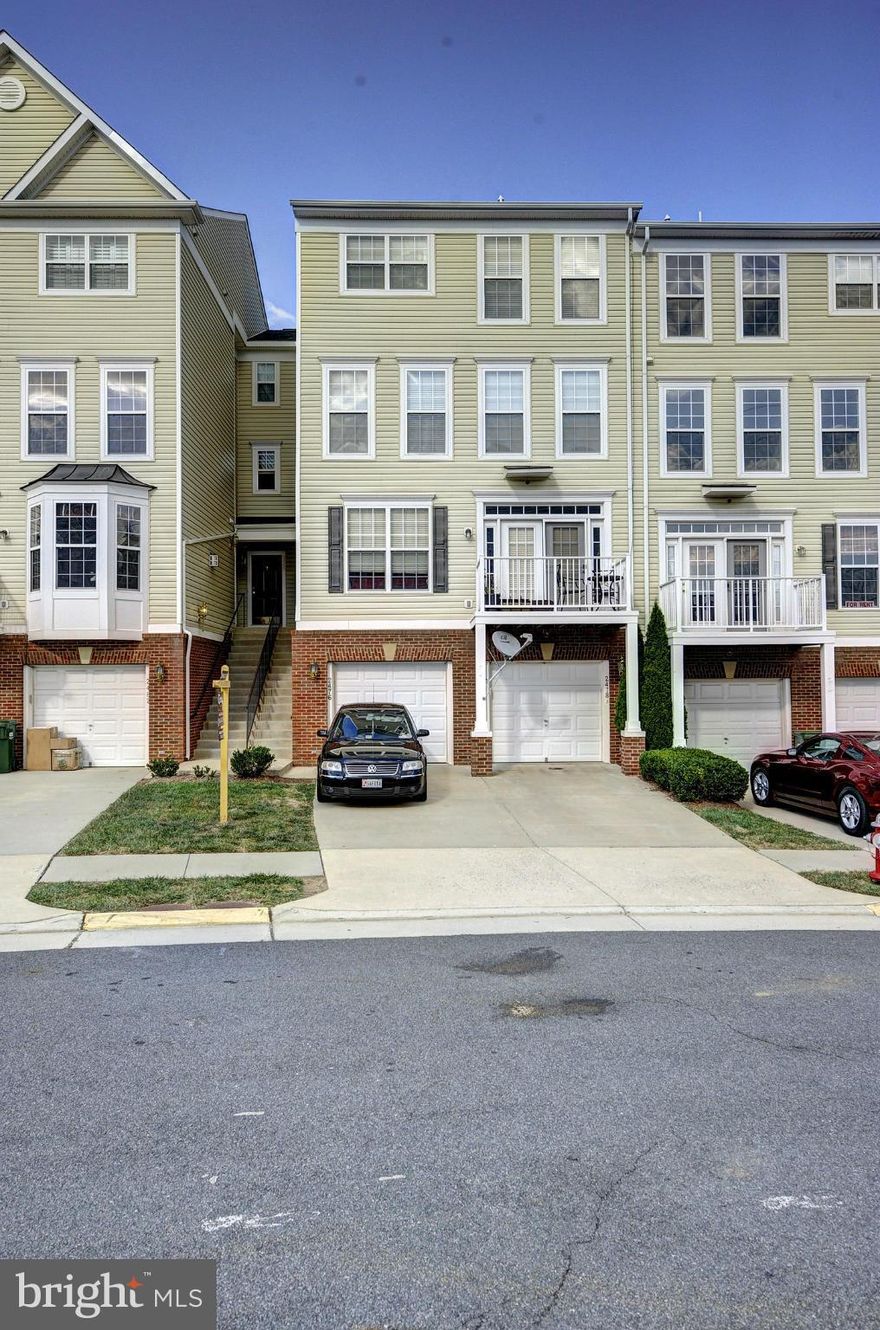 Spectacular Garage Townhome in Sought after Coppermine Crossing w/Hardwood floors, Kitchen w/Huge Granite Island Top, SS Appliances, Ceramic Tile in All Bathrooms,Second floor w/Two Large bedrooms, Huge Master bedroom w/Walk in Closet, Master bath w/ Sep Shower, Soaking Tub, Double Vanities. Walking trails, Playgrounds, Basketball. Close to Toll Road, Shopping, Restaurants, Silver Line Metro