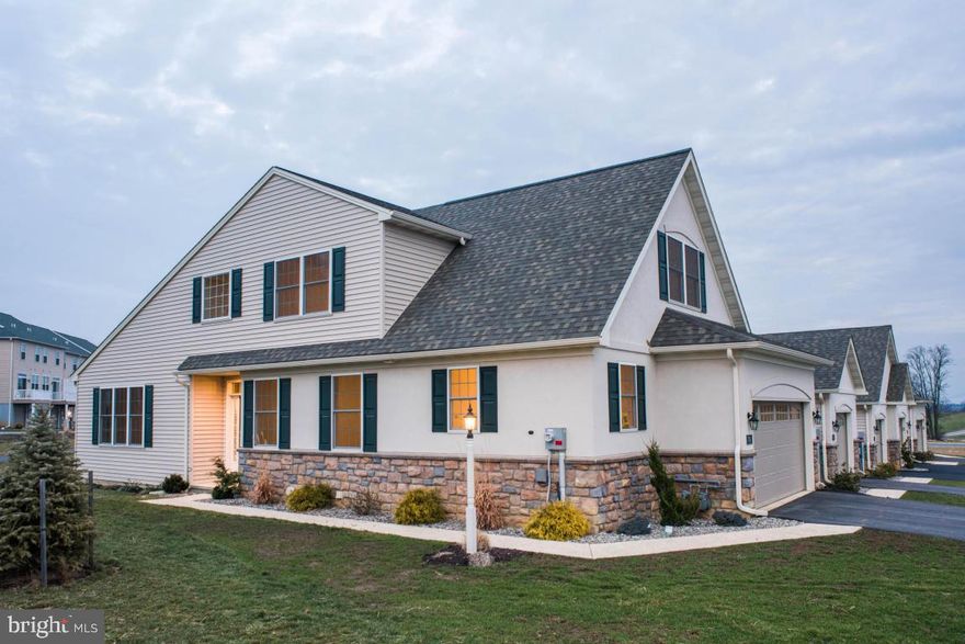 End Unit town home.  Open floor plan, 1st floor master, living & dining room, kitchen w/granite countertops, tons of cabinetry, convenient 1st flr laundry, Master bedroom w/ Walk-in-Closet, Bath w/ DBL sinks, granite, 2nd floor with loft, extra storage area, 2 bedrooms & full bathroom, Full unfinished basement, patio, Superior walls, Gas Heat. Convenient location off of Rte 30 and close to all amenities. Wood Edge neighborhood w/ walking paths,