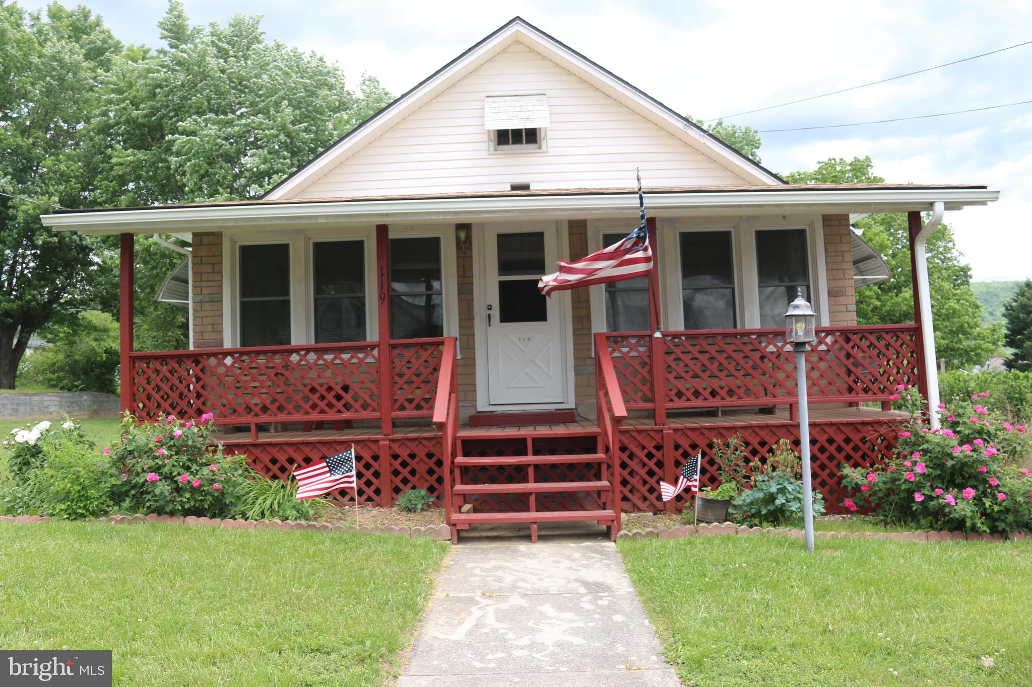Move in ready house on a double lot in town. It is walking distance to schools, restaurants, and shops. It has 2 bedrooms (options for a third) and one bath. New roof was put on in 2022. Hardwood floors, spacious kitchen, big back yard, raised garden bed, shed, big sunroom, and all appliances convey. Covered front porch and covered back patio and parking.