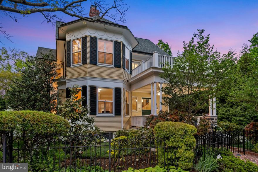 OPEN Tuesday, MAY 17, 12:00 to 2:00.  Exceptionally lovely and historic Queen Anne on one of Cleveland Park's most beautiful streets was designed by Robert Head, a noted architect at the turn of the century.  High ceilings, wonderful light, architectural detail,  plantation shutters are a few of the special features of this special home that has multiple porches, many bedrooms and front and back stairs.  Porches on the first and second floors have convertible windows that allow for year round use.  
Welcoming front porch opens to  generous foyer with large coat closet.  There is a front parlor with bay window and fireplace.  Larger second living room with built-ins, fireplace, glass door to side garden and terrace with lift enabling wheelchair access.  Dining room with bay window offers ample seating for large dinner parties. The beautiful cook's kitchen has  table space, a large island and opens to the family room/enclosed porch. Side entrance comes into the kitchen and mudroom area.
On the second floor is the primary suite with private porch, walk in closet, and private bath. ALSO on the second floor are four additional rooms, one used as an office, two additional baths and another enclosed porch currently used as a yoga/exercise room.  
The third floor, also served by both front and back stairs, has two bedrooms and one bath and loads of storage.
The lower level has a studio apartment or recreation room, a kitchenette, a full bath, wonderful laundry room just at base of stairs from kitchen, lots of storage and an oversized garage for one car plus a room for bikes or and/or garden equipment.