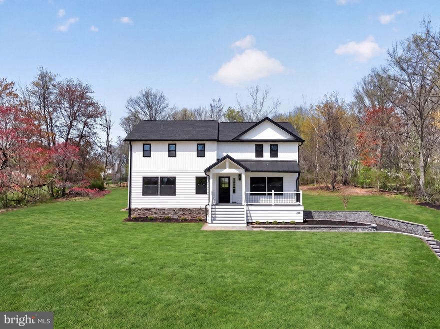 Welcome home to your 4 BR, 2 full bath and 2 half bath Contemporary Farmhouse on over an acre of private, wooded land in the heart of Warrington. This complete rebuild with new addition features every imaginable custom upgrade.  The exterior features a grand entrance with a bespoke hardscape walkway, a welcoming front porch, vertical and horizontal siding, and elegant ledger stone accents.
Inside, every detail is designed for luxury—hardwood floors throughout, a massive gourmet kitchen with quartz countertops, marble backsplash, a massive waterfall island with pop up receptacles, soft-close shaker cabinetry, induction stovetop, double wall oven, and top-of-the-line stainless steel appliances. The kitchen features a walk-out sliding door onto your rear patio as well as entry the basement. 
The open-concept living and dining areas flow seamlessly, into the kitchen with a private family room or office accessed through double French doors, featuring a 3 sided recessed touchstone electric fireplace with vertical tile and area for a wall mounted TV and direct access to the first-floor powder room and large laundry room complete with cabinets and a quartz countertop for folding clothes.
The second floor is accessed by your custom solid wood staircase with a wood banister and wrought iron spindles.  Upstairs, the hardwood floor continues in the hallway and into your grand primary suite addition that has a vaulted ceiling, a spa-like five-piece bath with porcelain and marble tile throughout, a standalone soaking tub, and a custom double vanity with gold fixtures and a quartz countertop. The primary bedroom also has a large walk-in closet with custom shelving and recessed lighting. Three additional oversized bedrooms have plush Stainmaster carpet, contemporary fan lights, and oversized closets with closet organizers. The large full bathroom offers a double vanity with a quartz countertop, LED vanity lighting, an oversized tub with custom tile surround and shower niche, black matte fixtures and an oversized linen closet.
The fully finished basement offers extra living space with waterproof longboard vinyl flooring, a second powder room and access to your utility room. Every system is brand new—dual HVAC, all new electrical, plumbing, and insulation, plus a brand-new interior sprinkler system. The home also has all new windows, a new shingled and metal roof, all new doors and hardware, a new driveway with culverts, and both interior and exterior French drains for a watertight home. 
The oversized two-car garage with new garage doors equipped with garage openers offers direct access to the finished basement, making it easy to bring groceries to the kitchen. With recessed lighting inside and out, a bright lamppost, and serene natural surroundings where deer often roam, this home is the perfect blend of privacy, modern luxury.