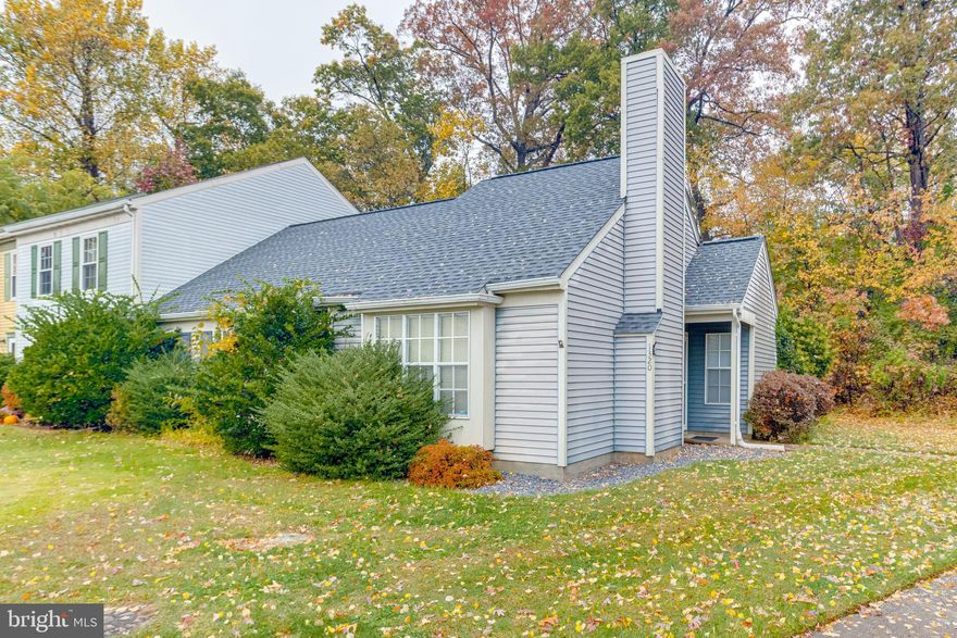 Welcome to simple, one floor living!  This end of group in Belcamp offers 2 beds and one full bath.  This home sits only9 moments from Rt 40, I-95 and APG along with  dining/shopping destinations.  Walking in will bring you to a full carpeted main level with a large living room with a fireplace and vaulted ceilings.  To the right is the dining room and kitchen with a door that opens out onto the rear deck.  The rear of the home faces woods for privacy and nature.  Back inside, down the main hallway is a  bathroom with a tub shower/combo, followed by two bedrooms.  The large primary suite also has its own deep walk in closet.  A new roof and skylight were just put on in 2024 which comes with a 30 yr warranty.   This house is. a great buy and is waiting for you!